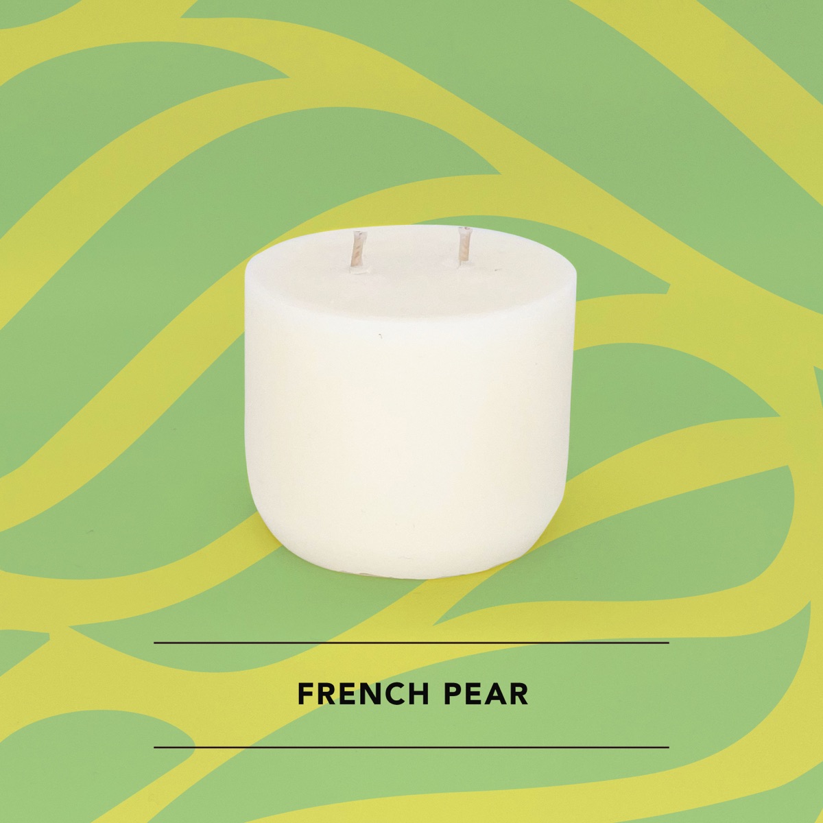 Honey Willow French Pear soy candle in a white vessel against a green wave print background