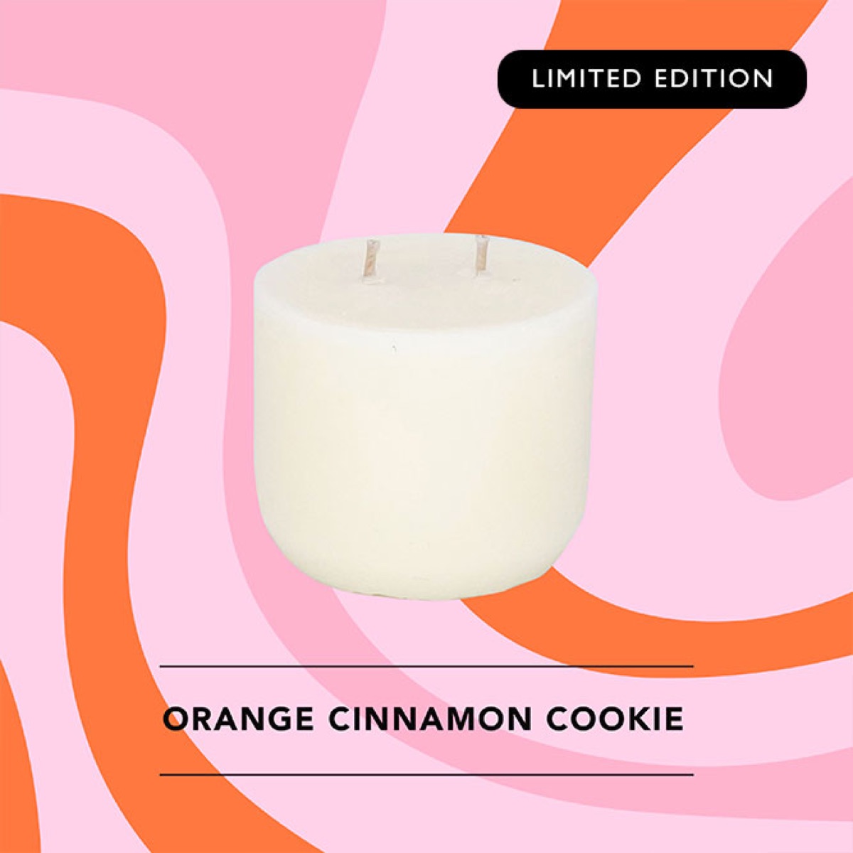 Honey Willow Orange Cinnamon Cookie limited edition soy candle in a white vessel against a pink and orange swirl background