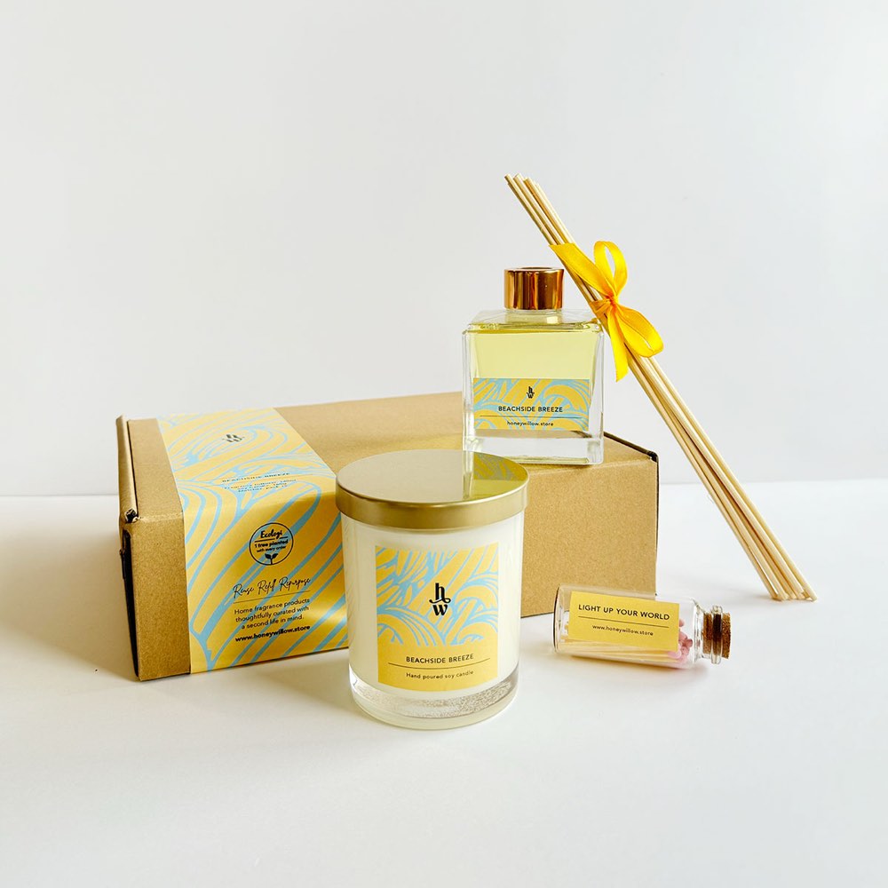 Honey Willow Beachside Breeze candle tin in a gift box with ribbon